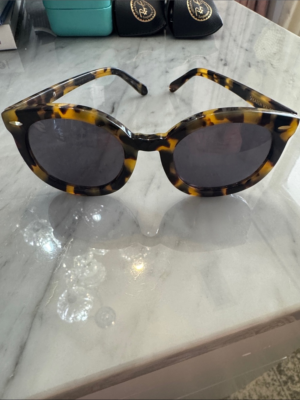 Karen Walker Round Tortoiseshell Sunglasses with Dark Lenses